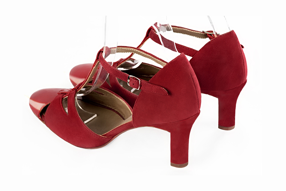 French elegance and refinement for these scarlet red dress T-strap open side shoes, 
                available in many subtle leather and colour combinations. A pretty model with a comfortable "Salomé" strap and good support.
Its charming spyglass cut-out gives you plenty of scope for personalisation.  
                Matching clutches for parties, ceremonies and weddings.   
                You can customize these shoes to perfectly match your tastes or needs, and have a unique model.  
                Choice of leathers, colours, knots and heels. 
                Wide range of materials and shades carefully chosen.  
                Rich collection of flat, low, mid and high heels.  
                Small and large shoe sizes - Florence KOOIJMAN